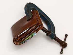 squeezed wallet